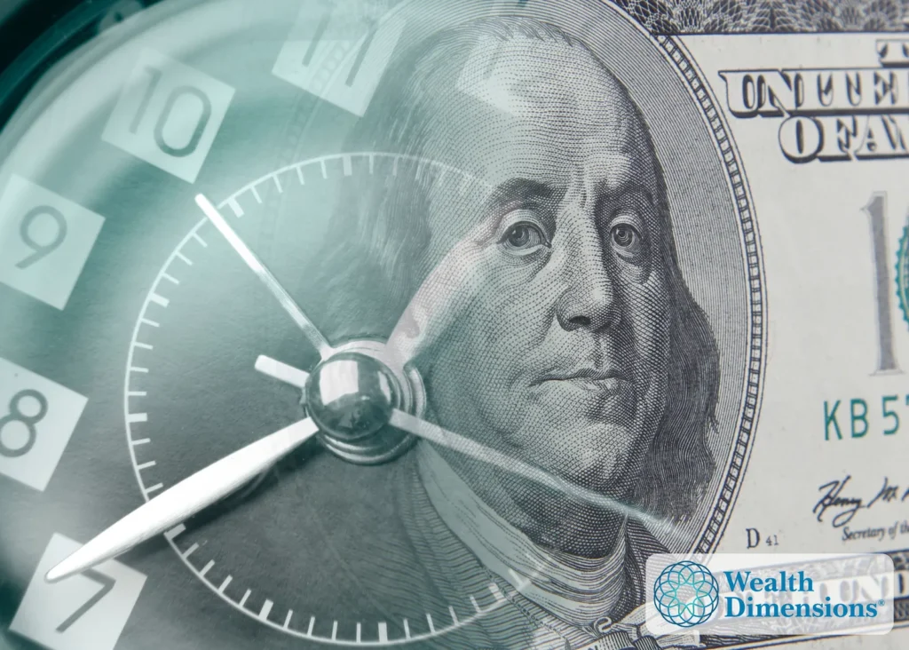 A person reviewing a long-term financial plan in natural light, representing the time value of money and the effect of early, consistent decisions.